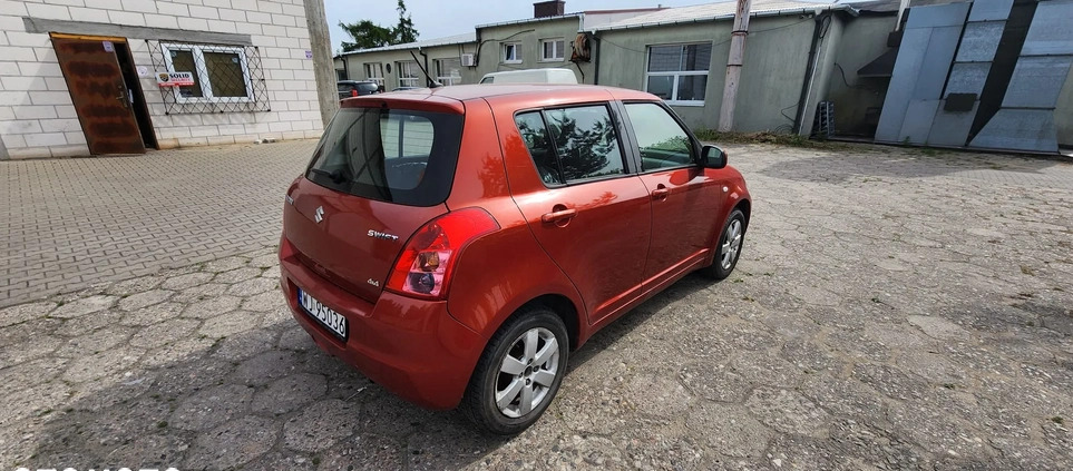 Suzuki Swift cena 12900 przebieg: 156230, rok produkcji 2009 z Warszawa małe 67
